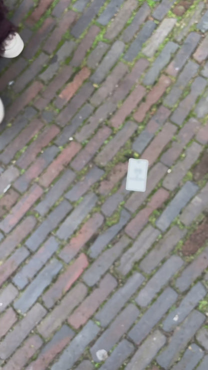 Universele telefoonkoord bevestiging